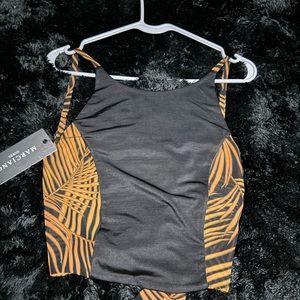 Tiger print tye back spaghetti strap crop top.